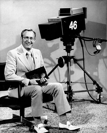 Ken posing in church television studio Ch 46